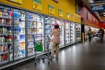 A customer shops for produce at an H-E-B grocery store on February 12, 2025 in Austin, Texas.