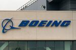 SEATTLE, WASHINGTON - OCTOBER 24: A Boeing sign is seen on the exterior of a building as Boeing workers gather on a picket line near the entrance to a Boeing facility during an ongoing strike on October 24, 2024 in Seattle, Washington. Yesterday, members of the International Association of Machinists and Aerospace Workers District 751 voted to reject Boeing's latest contract offer. (Photo by David Ryder/Getty Images)