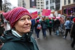 A woman pauses to take in the crowd during the Women's March on Portland on Saturday, Jan. 21, 2017.