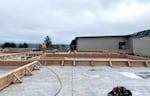 The new gymnasium being constructed at Yaquina View Elementary School in Newport, Ore, part of the Lincoln County School District. The district is paying for the new gym with funds from the American Rescue Plan.