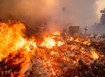 Flames engulf a structure during the Mountain Fire, Wednesday, Nov. 6, 2024, near Camarillo, Calif.