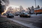 Commuters drive slowly the morning of Wednesday, Feb. 21, 2018, following an overnight snowstorm.