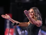 Co-chair of the Republican National Committee Lara Trump blows kisses to her father-in-law, former President Donald Trump, after speaking during the second day of the 2024 Republican National Convention at the Fiserv Forum in Milwaukee on Tuesday.