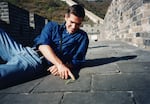 Christopher Marley with a mantis on the Great Wall of China. This was just one of the many insects Marley interacted with while traveling all around the world. 