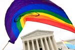 In this Oct. 8, 2019, file photo, people gather outside the Supreme Court in Washington. The Supreme Court has declined to take up an appeal from parents in Oregon who want to prevent transgender students from using locker rooms and bathrooms of the gender with which they identify, rather than their sex assigned at birth.