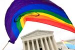  In this Oct. 8, 2019, file photo, people gather outside the Supreme Court in Washington. The Supreme Court has declined to take up an appeal from parents in Oregon who want to prevent transgender students from using locker rooms and bathrooms of the gender with which they identify, rather than their sex assigned at birth.  