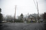 Snow falling in a neighborhood in Southeast Portland Tuesday, Feb. 20, 2018.