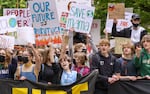 FILE - Thousands of area youth climate activists and supporters marched through downtown Portland, May 20, 2022, as part of a youth-led climate mobilization demanding city leaders take meaningful action on climate change.