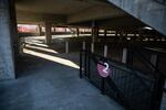 A parking lot outside Moda Center sits empty in Portland, Ore., Thursday, March 12, 2020. This lot would normally be full on a night the Trail Blazers were set to host the Memphis Grizzlies. The game was postponed when the NBA season was suspended due to coronavirus.