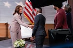 Democratic presidential nominee Vice President Kamala Harris, left, shaking hands with Gerren Keith Gaynor, center, as Eugene Daniels, second from the right, and Tonya Mosley, far right, look on after being interviewed by the National Association of Black Journalists at the WHYY studio in Philadelphia, Tuesday, Sept. 17, 2024.