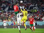 Youssef En-Nesyri of Morocco soars high to head the ball and score the team's first goal during Morocco-Portugal quarterfinal at the World Cup in Qatar on December 10, 2022.