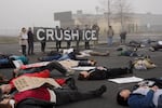 Demonstrators perform a "die-in" at Medford’s Immigration and Customs Enforcement office on Jan. 13, 2026.