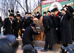 Members of the Inner Circle wake up Punxsutawney Phil to give his annual winter forecast.