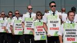 Off-duty Delta Air Lines pilots picket at Salt Lake City International Airport Thursday, June 30, 2022, in Salt Lake City.