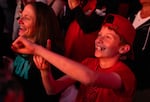 Tobin Schlesinger, 11, mimics the “Dame Time” gesture in support of Portland Trail Blazers guard Damian Lillard as he’s introduced before the game.