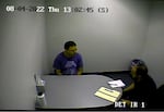 Security camera footage shows Christopher Knipe being questioned by Portland police detective Scott Broughton, in August 2022. Knipe was charged with Sean Kealiher's murder and is being held without bail.