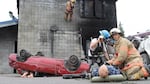 First responders rescue dummies from crumpled cars during the Cascadia Rising earthquake simulation in 2016.