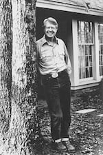 FILE - Former Georgia Gov. Jimmy Carter poses for a picture in blue jeans outside his home in Plains, Ga., Feb. 8, 1976, as he takes a break from campaigning for the Democratic nomination for president.