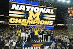 Michigan celebrates after defeating UConn in the NCAA college basketball tournament national championship game at the Final Four, Monday, April 6, 2026, in Indianapolis.