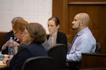 Defendant Guillermo Raya Leon, right, is pictured with his defense team at the Clark County Courthouse before opening statements in his aggravated murder trial Friday afternoon, Sept. 8, 2023. 