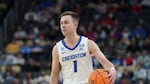 Creighton's Steven Ashworth (1) brings the ball up court during the second half of a college basketball game against Oregon in the second round of the NCAA men's tournament Saturday, March 23, 2024, in Pittsburgh.