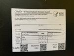 A card with proof of COVID-19 vaccination.