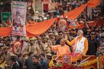 Indian Prime Minister Narendra Modi waves to supporters on May 13 in Varanasi, India.  
