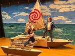 Andrew DiDonato's three children Rosalie (in white t-shirt), Liliana (sitting) and Massimo (standing) on the boat he built for Rosalie's school play, Moana Junior.