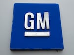 The General Motors logo is displayed outside the General Motors Detroit-Hamtramck Assembly plant, Jan. 27, 2020, in Hamtramck, Mich.