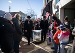 Punxsutawney Phil tours the town as visitors stop to catch a glimpse of him on Saturday.