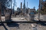 A service station that was destroyed by a wildfire is shown Tuesday, Sept. 8, 2020, in Malden, Wash. High winds kicked up wildfires across the Pacific Northwest on Monday and Tuesday, burning hundreds of thousands of acres and mostly destroying the small town of Malden in eastern Washington state. (AP Photo/Jed Conklin)