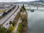 The Vera Katz Eastbank Esplanade, a bicycle and pedestrian path along the east side of the Willamette River, right, looking south towards the Hawthorne Bridge, March 26, 2024 in Portland, Ore. Interstate 5 is on the left.