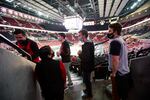 Fans walk to their seats before an NBA basketball game between the Portland Trail Blazers and the Los Angeles Lakers in Portland, Ore., Friday, May 7, 2021. The game was the first fans were allowed to attend since the beginning of the coronavirus pandemic.