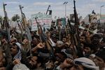 Houthi supporters chant slogans and hold pictures of Abdul Malik al-Houthi, the leader of the Houthi movement, during an anti-U.S. and anti-Israel rally in Sanaa, Yemen, Monday, March 17, 2025.