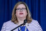 In this June 21, 2019 file photo, General Services Administration Administrator Emily Murphy speaks during a ribbon cutting ceremony for the Department of Homeland Security's St. Elizabeths Campus Center Building in Washington.   The head of the obscure federal government agency that is holding up Joe Biden's presidential transition knew well before Election Day she might have a messy situation on her hands well.