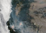 NASA's Aqua satellite captured the image of southwestern Oregon wildfires and smoke blowing from them on Aug. 6, 2018, with the Moderate Resolution Imaging Spectroradiometer, MODIS, instrument.