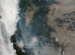 NASA's Aqua satellite captured the image of southwestern Oregon wildfires and smoke blowing from them on Aug. 6, 2018, with the Moderate Resolution Imaging Spectroradiometer, MODIS, instrument.