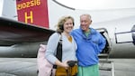 KUOW/EarthFix Reporter Ashley Ahearn and her father, Joe Ahearn, Jr., standing next to a B-17 like the one Joe Ahearn, Sr., flew on as a radioman during World War II bombing missions over Nazi Germany.