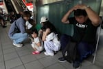 People take cover inside at a MRT station during the Urban Resilience (Air-Defense) Exercise, part of the annual Han Kuang military exercises in Taipei, Taiwan, Thursday, Aug. 13, 2026.