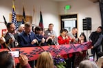 From left Michael Bounocore, Portland Mayor Ted Wheeler, Margaret Salazar, Confederated Tribes of Siletz Indians Chair Delores Pigsley, and Eric Paine cut the ribbon to Nesika Illahee in the Cully neighborhood of Portland, Ore., Wednesday, Jan. 29, 2020. Nesika Illahee is an affordable housing community developed in partnership with the Siletz to address homelessness.