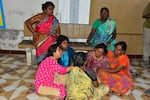 Relatives of people who were killed in a stampede during a rally for a popular Indian actor and politician, mourn outside a hospital, in Karur, in the southern state of Tamil Nadu, Saturday, Sept. 27, 2025.