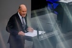 German Chancellor Olaf Scholz speaks during a plenary session at the German parliament Bundestag where he faces a vote of confidence, Berlin, Germany, Monday, Dec. 16, 2024.