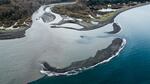 When this photo was taken, about 3 million cubic yards of sediment had been flushed down the Elwha River since dam removal began in 2011. That’s only 16 percent of what’s expected to move downstream over five years.