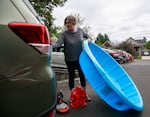 Erin Bernard loads the pool she purchased from Hankins Hardware True Value into her car on July 3, 2024. Bernard came here specifically to buy a pool after hearing news about the heatwave this morning. A resident of northeast Portland, Bernard says, "my block doesn't have a lot of trees. So the heat just bakes us."
