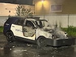 A provided photo showing damage to a police vehicle, one of at least 15 Portland police vehicles burned early Thursday, May 2, 2024, at the police bureau's northeast Portland training center, near the airport. Officials suspect arson.