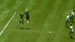 Argentina's Diego Maradona scores his infamous "Hand of God" goal over England goalkeeper Peter Shilton during the 1986 FIFA World Cup quarter-final at Mexico City's Azteca Stadium on June 22, 1986, as England defenders Kenny Sansom (top), Gary Stevens (centre) and Terry Fenwick look on.