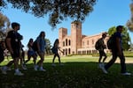 Students walk past Royce Hall on the University of California, Los Angeles campus on Aug. 15, 2024.