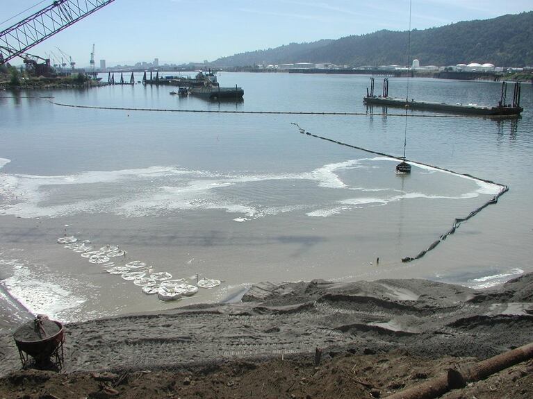 Organophilic clay was used to cap river sediment contaminated by creosote from the McCormick & Baxter site. 