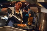 Alexa Numkena-Anderson, Javelina chef and owner, flips a piece of frybread cooking in hot oil at the Street Disco kitchen in southeast Portland on Feb. 28, 2024.