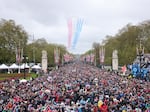 The Royal Air Force Aerobatic Team, otherwise known as The Red Arrows, fly over The Mall during the Coronation of King Charles III and Queen Camilla on Saturday.